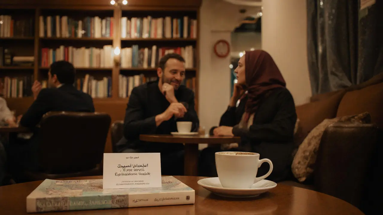 Man and woman having calm conversation in cultural lounge with guidebook and coffee